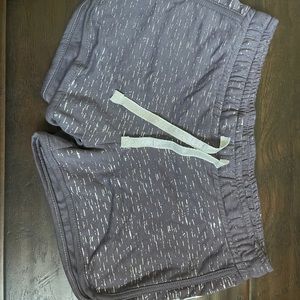 Dusty purple bebe booty shorts